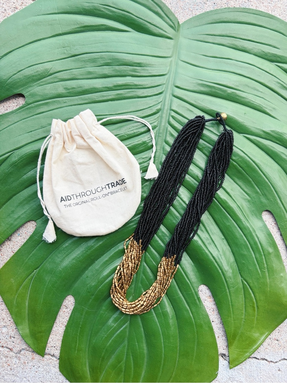 Aid Through Trade Fair Trade Black and Gold Beaded Hema Necklace